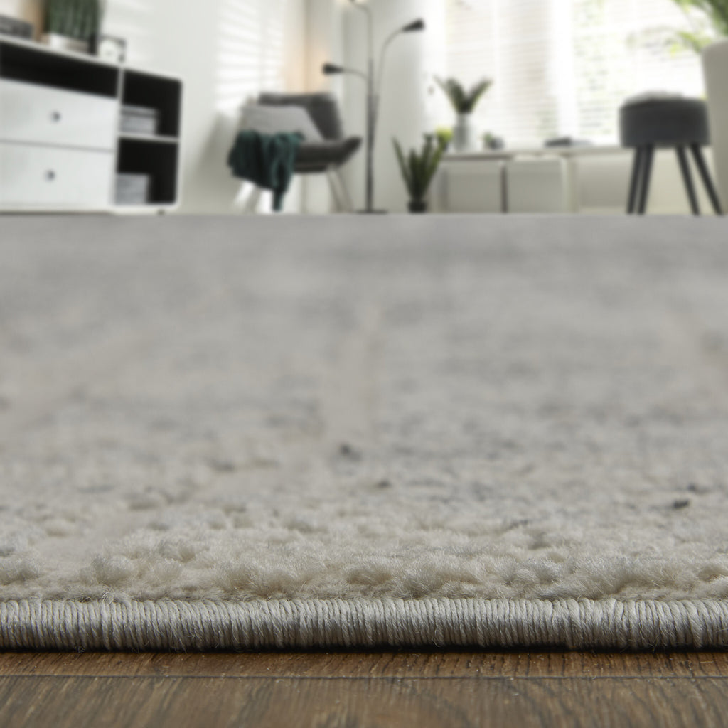 4' X 6' Ivory Gray and Black Abstract Power Loom Area Rug