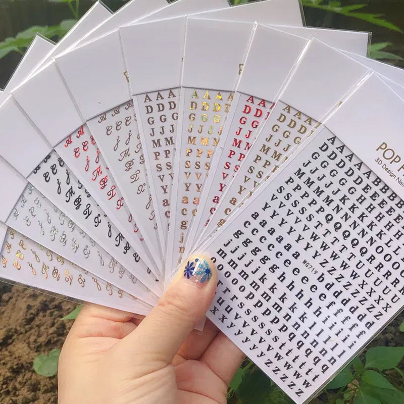 Color: Brown - 1PCS New English Alphabet Nail Stickers Multi-Color Laser Reflective Nail Slider Art Cool Text Nail Kit
